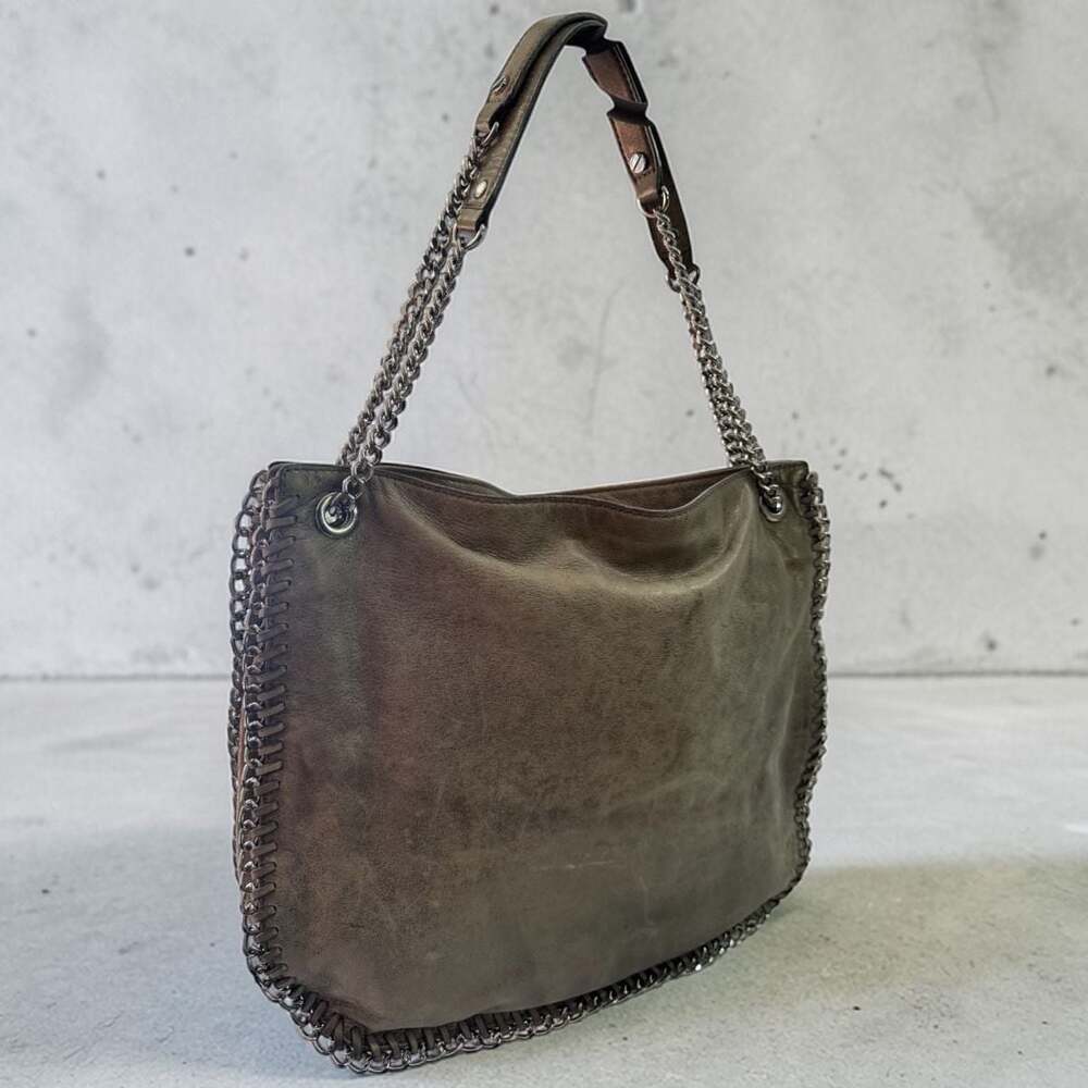 Michael Kors Large Braided Grommet Silver Metallic Leather Shoulder Bag